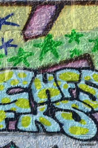 Afbeeldingen van Fragment of graffiti drawings The old wall decorated with paint stains in the style of street art culture Colored background texture in green tones